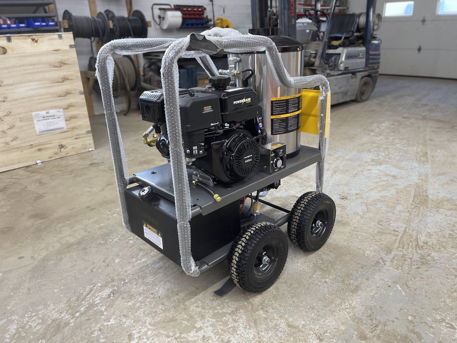 Power Ease engine and pump close-up on BE commercial hot water pressure washer