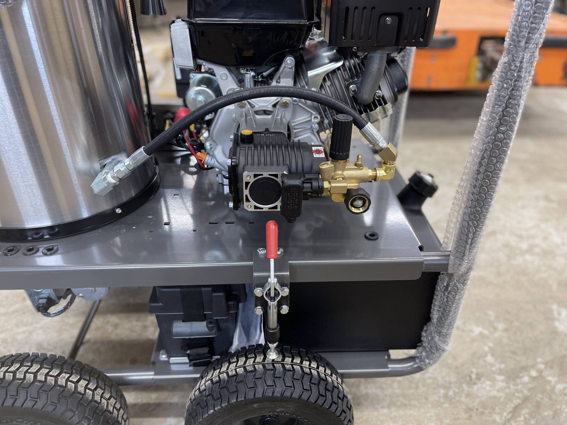 Close-up of AR triplex pump and engine mounting on BE commercial pressure washer