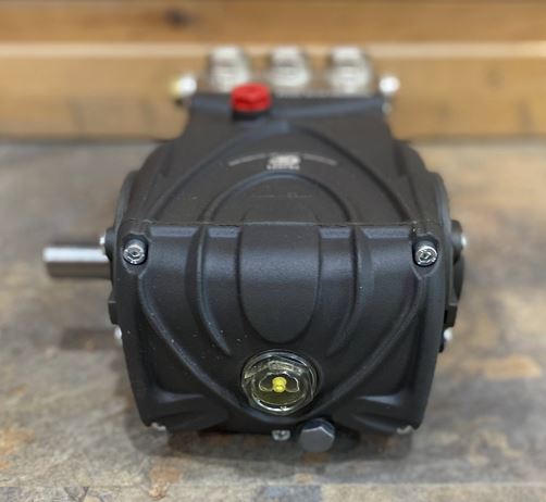 Angled rear view of General Pump TS2021 crankcase with oil sight glass and shaft