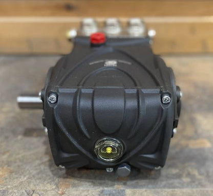 Angled rear view of General Pump TS2021 crankcase with oil sight glass and shaft