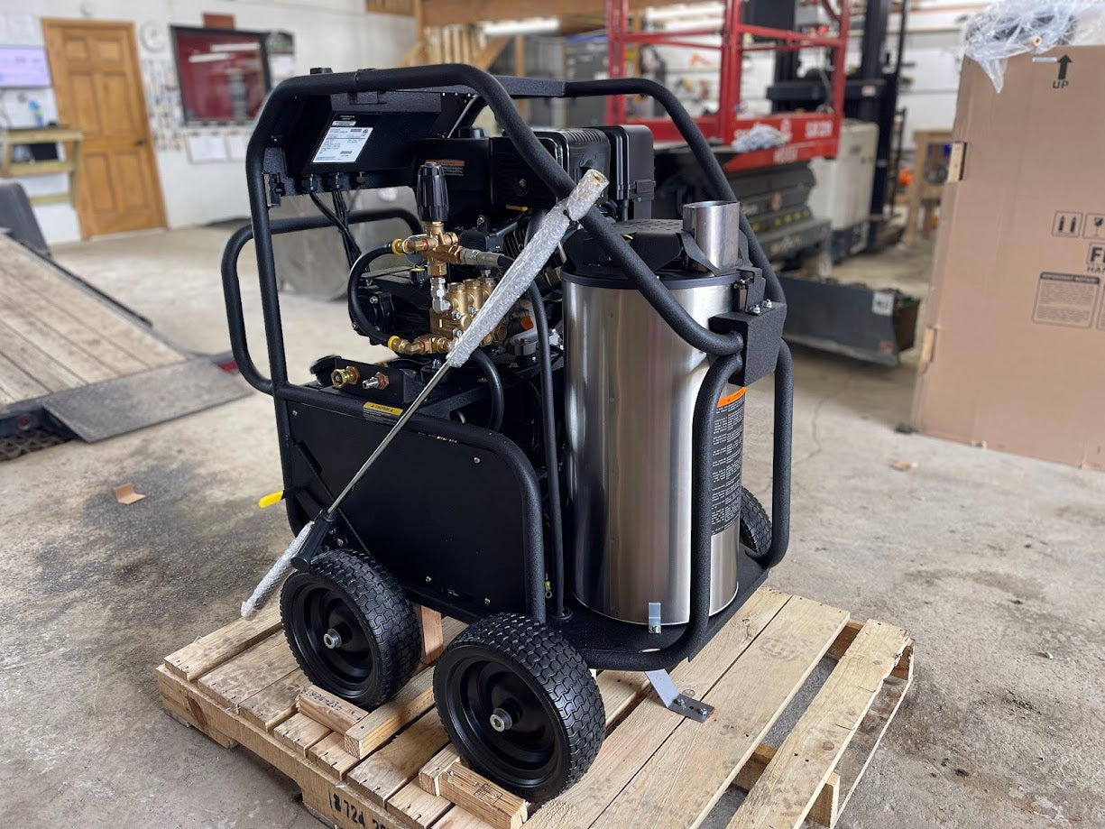 Kärcher LFT Cage pressure washer showing stainless burner coil housing, pump manifold, and spray lance