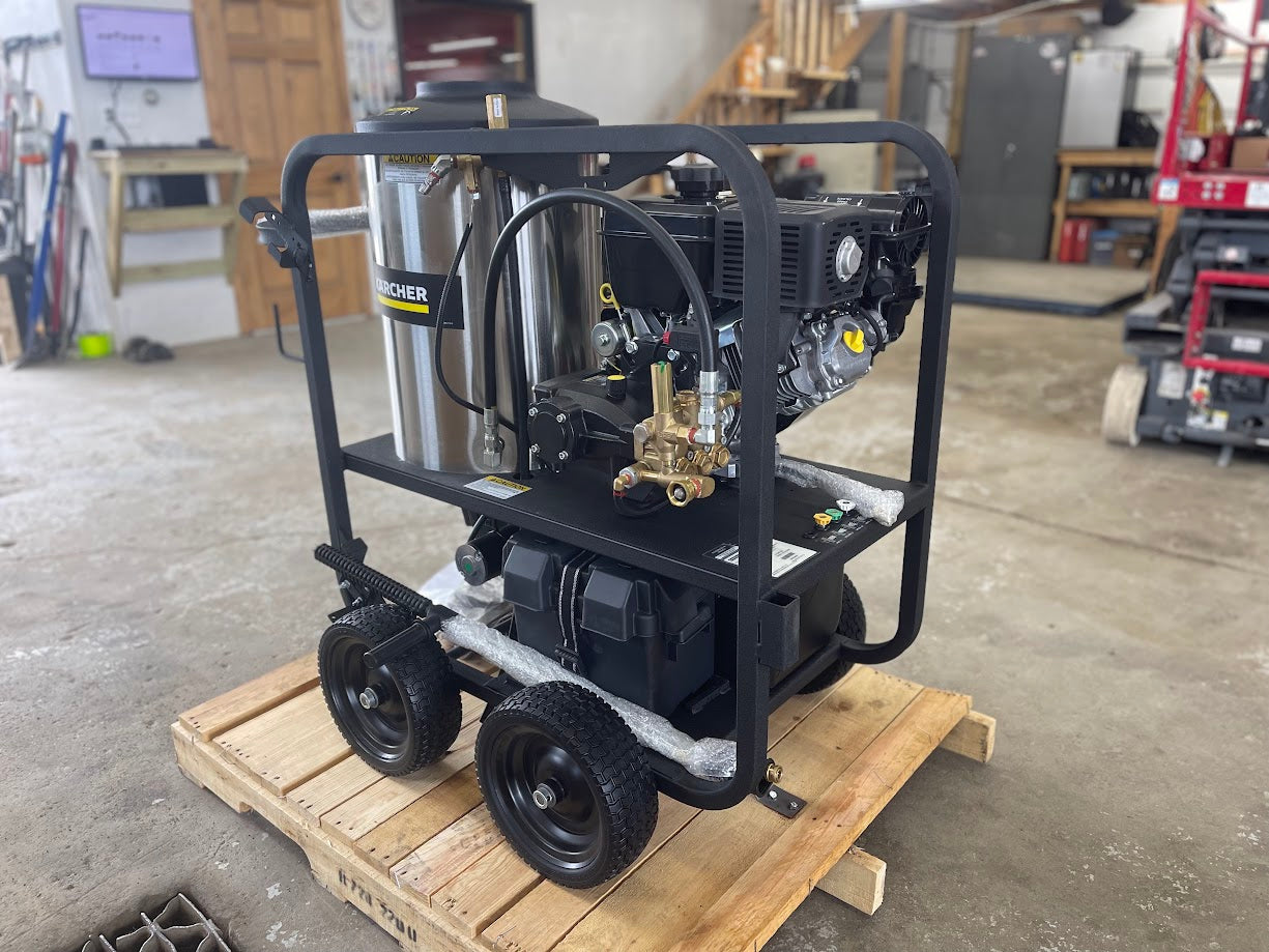 Karcher pressure hot power washer showing pump manifold and Vanguard engine mounted on cart