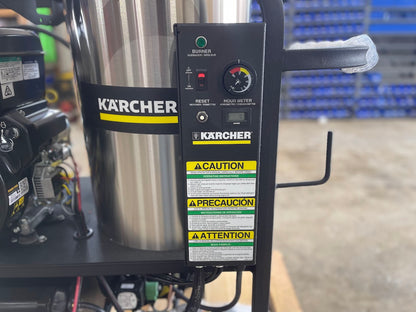 Karcher control panel showing burner switch, pressure gauge, and hour meter on the hot water pressure washer