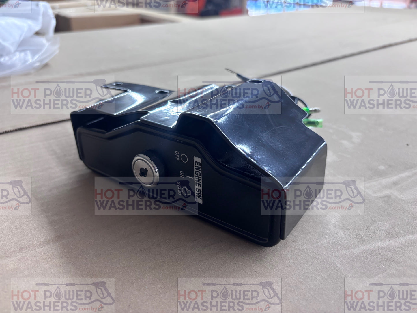 Side view of the black Lifan ignition switch box showing the key cylinder and wiring