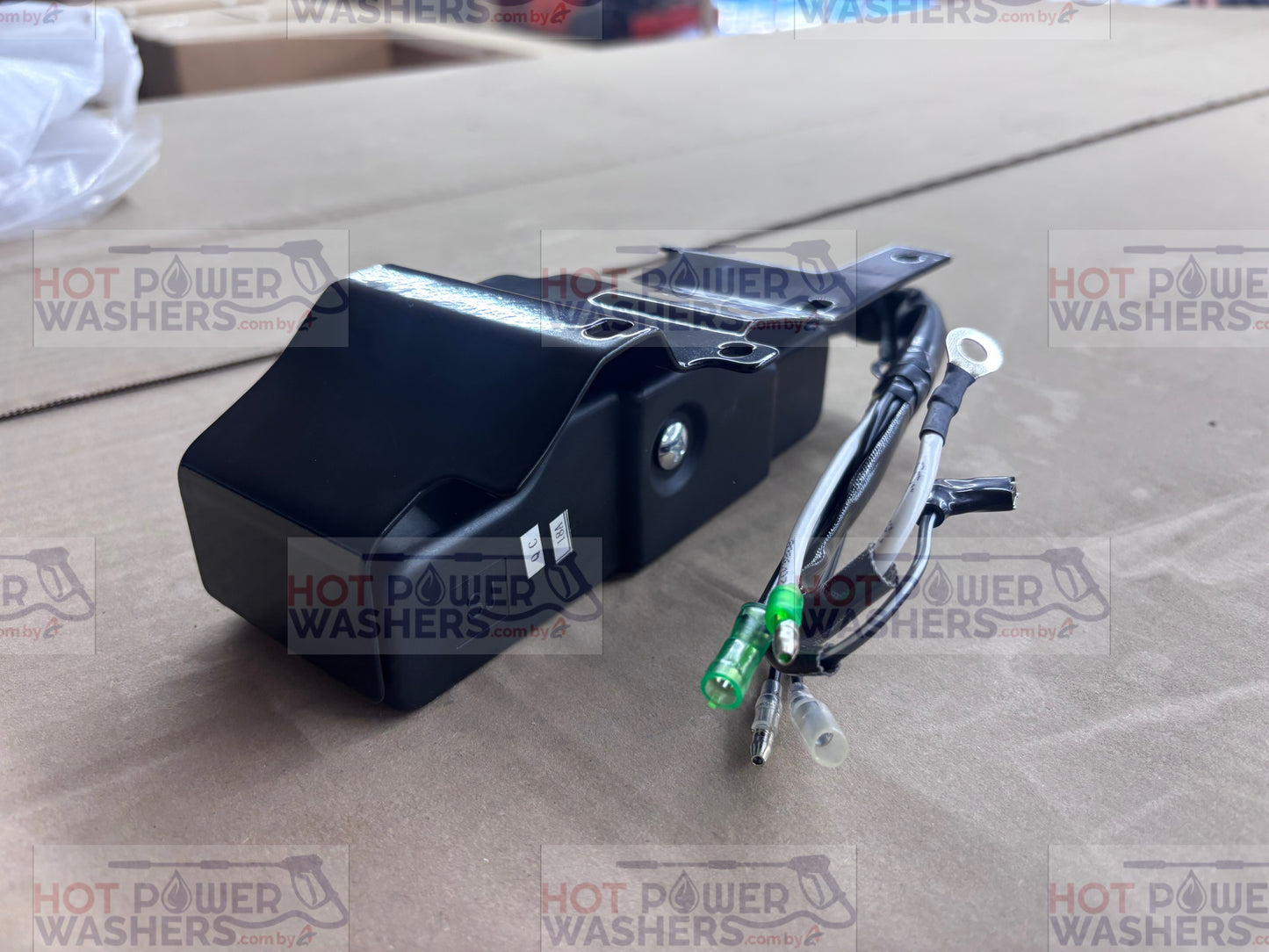 Lifan ignition switch box with attached wiring harness and connector plug on a cardboard surface