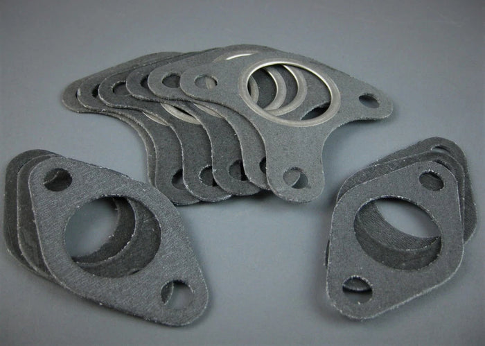 Set of six metal muffler gaskets for Honda GX390, GX340, GX270, GX240 and 188F engines on a gray background